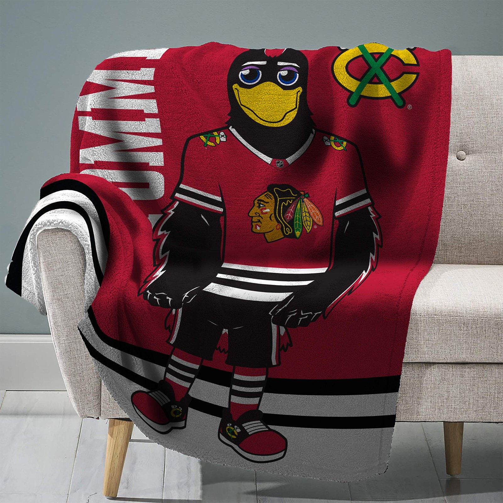 91Gmnb0msjL.jpg Chicago Blackhawks Tommyhawk Raschel Blanket - Image 1